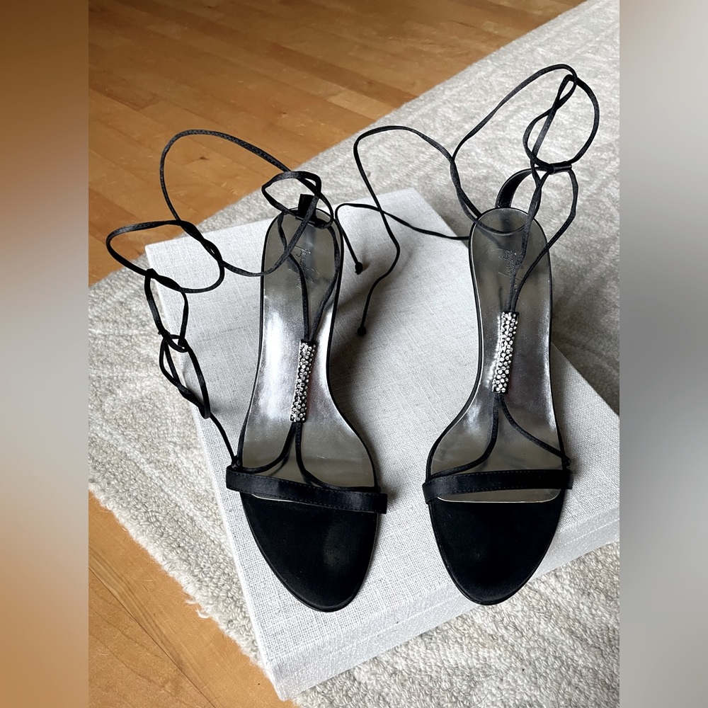 Lace up ankle black and silver heels.